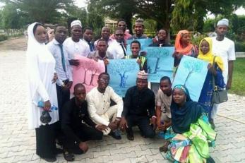 Climate ambassadors in adamawa state lead other youth in a tree-planting campaign.