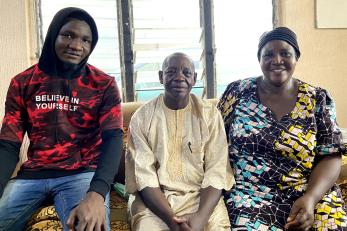 Members of a family sitting together.