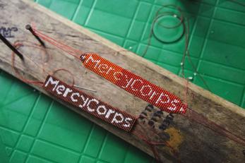 A stabilizing board used to craft bracelets.